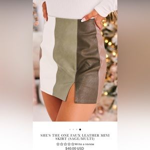 Shes the one faux leather mini multi color. This is a darling multi color skirt
